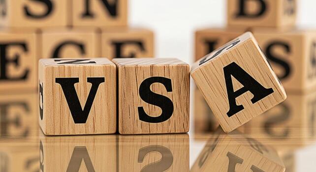 Wooden alphabet blocks spelling out VSA on a reflective surface creating a playful and educational atmosphere ideal for illustrating concepts related to learning early childhood education and language photo