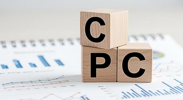 Wooden blocks displaying CPC resting on a financial report in a bright modern office symbolizing cost per click advertising and the importance of datadriven decisions for business growth and success photo