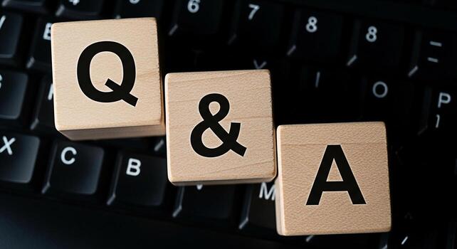 Wooden blocks displaying Q A on a computer keyboard symbolizing questions and answers knowledge sharing and problemsolving in a digital environment fostering a collaborative and informative atmosphere photo