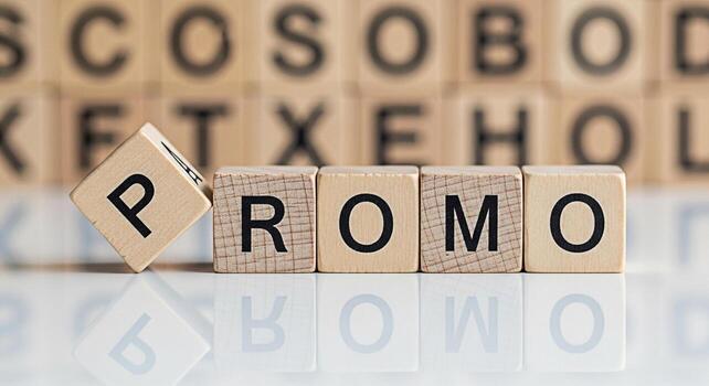 Wooden blocks spelling out PROMO on a reflective surface with a playful tilted P block adding a dynamic element suggesting a special offer discount or promotional campaign in a business or retail sett photo