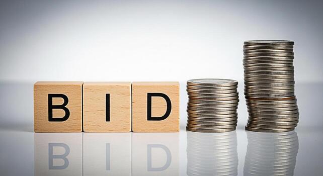 Wooden blocks spelling BID next to stacks of coins on a reflective surface representing a competitive offer in a business context symbolizing investment auction and financial strategy in a neutral set photo