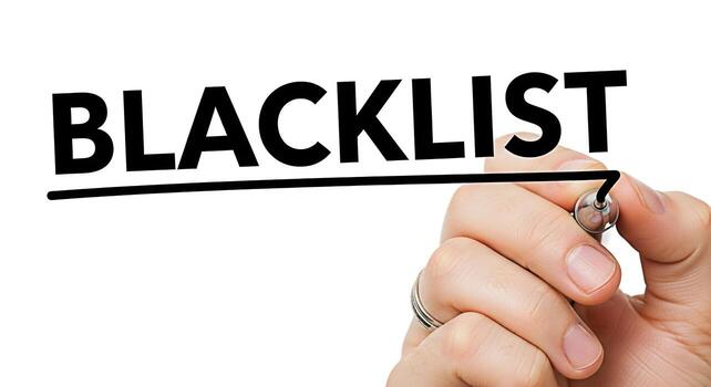 Human hand underlining the word Blacklist on a white background with a marker representing restriction exclusion and the negative consequences of being blacklisted in a business or social context photo