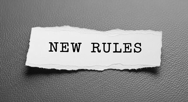 Rasgado papel resbalón mostrando nuevo reglas en un texturizado gris superficie simbolizando cambio y adaptación en un negocio ambiente transporte un mensaje de innovación y estratégico cambio foto