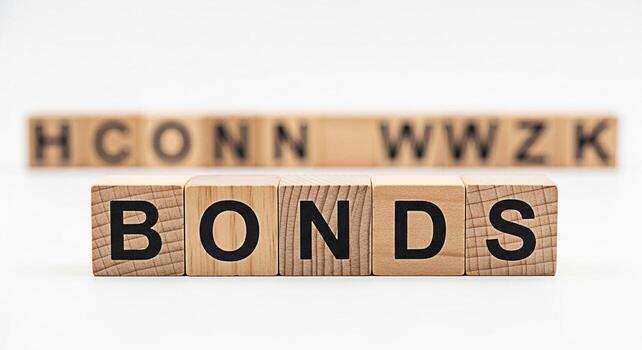 Wooden blocks spelling BONDS on a white surface representing financial instruments and investment strategies conveying a sense of stability and security in the financial market with a focus on fixed i photo