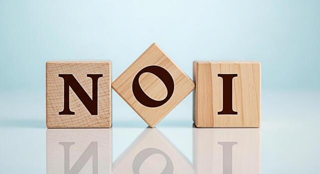 Wooden blocks spelling NOI on a reflective surface against a soft blue background representing a Notice of Intent conveying a sense of formality and compliance in a business or legal context photo