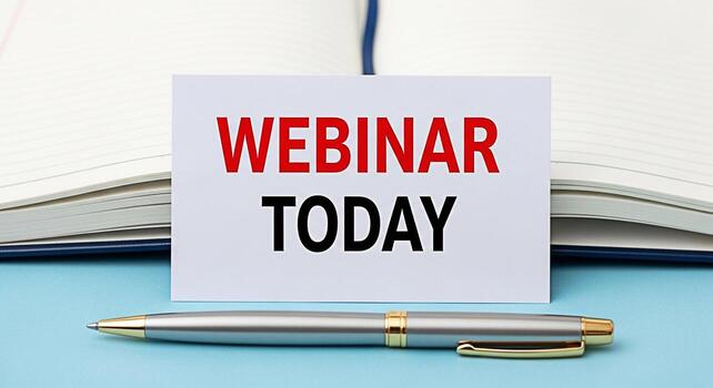 Informative card announcing a webinar today positioned on a light blue surface with an open notebook in the background creating a sense of urgency and importance for online learning and professional d photo