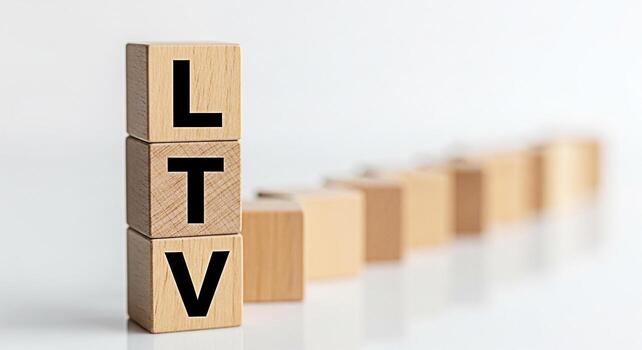 Wooden blocks displaying LTV in a clean bright studio setting representing customer lifetime value and emphasizing the importance of longterm business relationships for sustainable growth and profitab photo