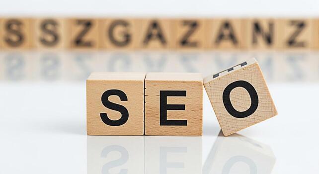 Wooden blocks spelling SEO on a white reflective surface representing search engine optimization strategies and digital marketing techniques for online business success and improved website visibility photo