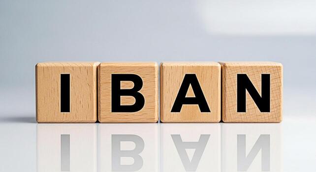 Wooden blocks displaying IBAN on a reflective surface in a studio setting representing international banking and financial transactions with clarity and precision for global commerce and secure money photo