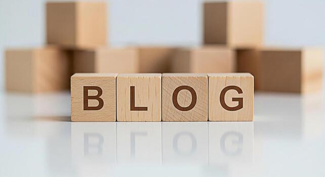 Wooden blocks spelling out BLOG on a reflective surface surrounded by other blocks symbolizing online content creation sharing ideas and fostering a sense of community and engagement in the digital wo photo