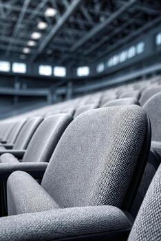 Empty seats awaiting fans in a large sports venue before the event starts photo