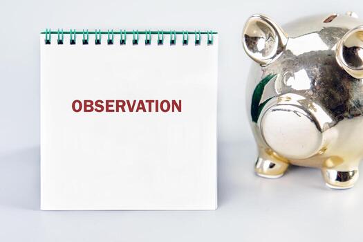 OBSERVATION word written in a notebook on a light background. Observation concept image photo