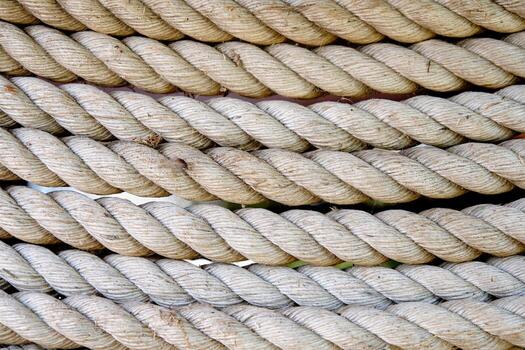 background of rope in a row with parallel lines close-up photo