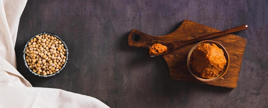 Soybean paste for snack in a bowl on the table top view web banner photo