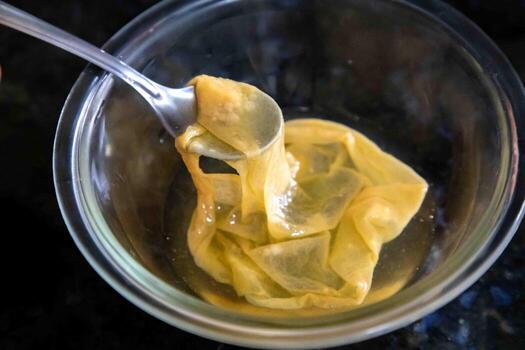 The mother of apple cider vinegar is a cloudy, gelatinous substance composed of bacteria and yeast that forms during the fermentation process. yu photo