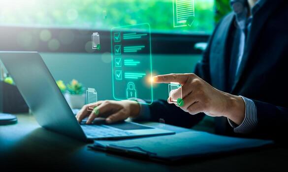 Business compliance and digital document security concept with businessman using laptop and holographic checklist interface for data protection, regulation, and secure online management system photo