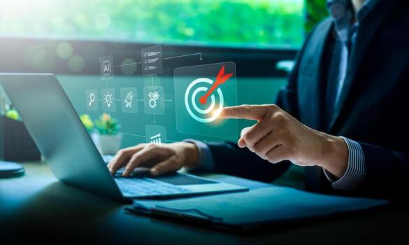 empresario utilizando ordenador portátil con virtual interfaz demostración objetivo icono y estratégico planificación proceso, simbolizando digital objetivo configuración, proyecto gestión, artificial inteligencia, y negocio éxito foto