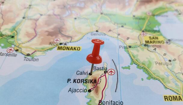 View of Calvi, is a commune in the Haute-Corse department of France on the island of Corsica, on a geographical map of Europa, marked with red pushpin photo