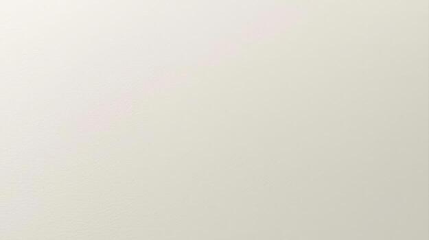 A subtly textured off-white surface creates a serene and understated backdrop suitable for various design and photographic applications. photo