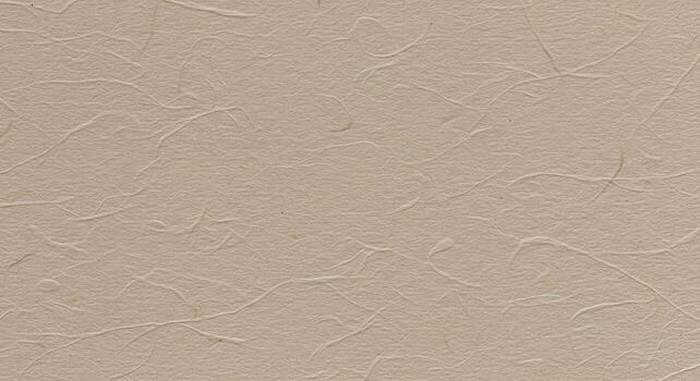 Subtle beige paper background features delicate textured fibers creating an organic and slightly rough surface for artistic use and presentations. photo