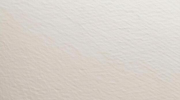 Textured beige paper showcases its rough and grainy surface, creating a subtle pattern of shadows and highlights on a neutral s sheet. photo