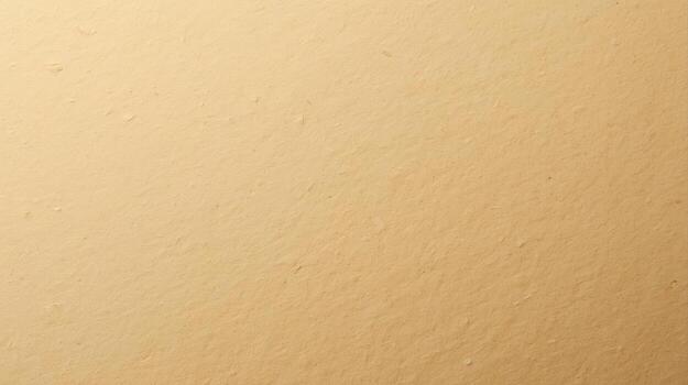 A close up view showcases the subtle textures and warm beige color of a stucco wall, providing a versatile background element for designers. photo
