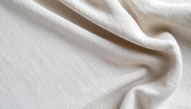 Soft, light beige linen fabric displays gentle, flowing waves and subtle textures perfect for elegant, minimalist designs and backgrounds alike. photo