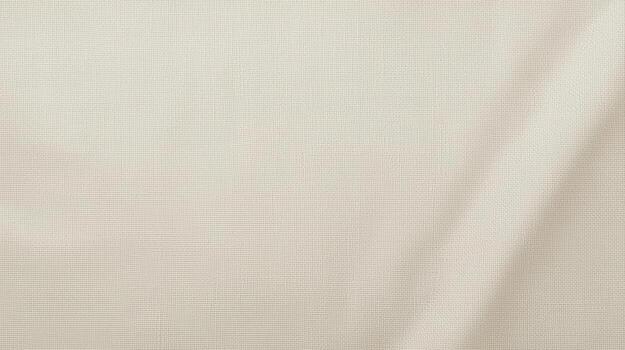 The soft, natural light illuminates the subtle texture and gentle folds of a cream-colored fabric, creating a smooth and elegant backdrop. photo