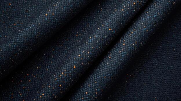 A close up texture of dark blue woven fabric with subtle light specks creating a visually appealing and textured abstract background effect. photo