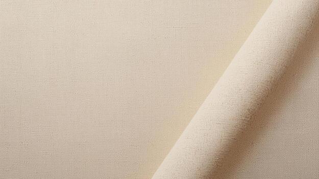 Close-up of elegant cream-colored fabric delicately draped showing subtle texture and soft light creating a luxurious sophisticated backdrop. photo