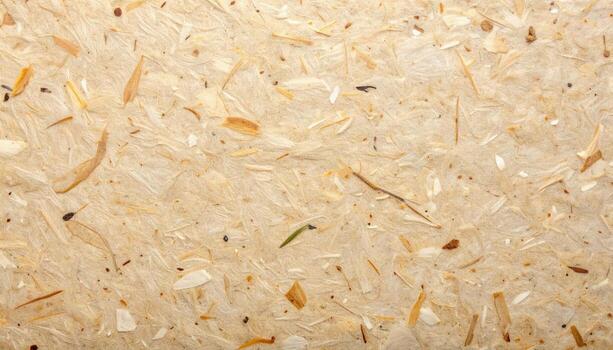 The textured surface of handmade paper made with natural fibers showcases a unique and organic look perfect for crafts or stationery projects. photo