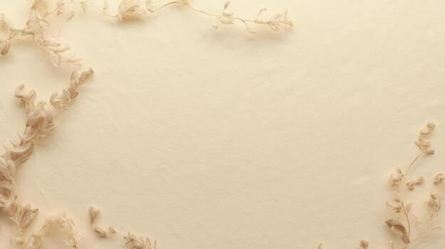 Delicate dried flowers are scattered across a textured cream colored background creating a soft and natural aesthetic for graphic design projects. photo