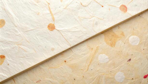 The textured surface reveals handmade paper with embedded organic elements, evoking a natural and earthy aesthetic quality in its design elements. photo