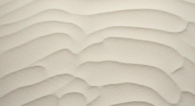 Abstract beige sand dunes texture background showing natural wavy patterns created by wind for a minimalist desert aesthetic design element. photo