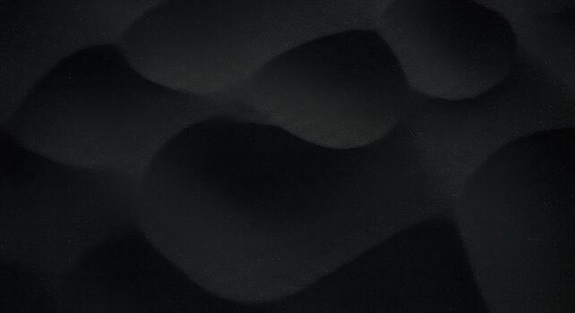 Dark abstract background featu smooth waves with subtle texture and contrasting shadows creating a three dimensional artistic design look. photo