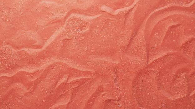 An abstract terracotta surface with curving lines and speckled texture creates a warm, earthy, and visually intriguing background element. photo