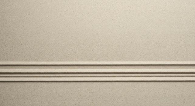 Light beige wall paneling with decorative trim provides a textured, minimalist background for architectural design and interior decoration projects. photo