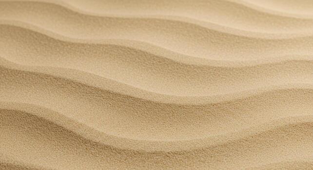 An abstract macro shot reveals the flowing, rhythmic patterns and textures created by windblown sand across a vast and sunlit desert landscape. photo