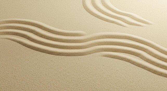 Wavy lines are delicately etched into the pristine sand, evoking a sense of tranquility and meditative calm within a minimalist composition. photo