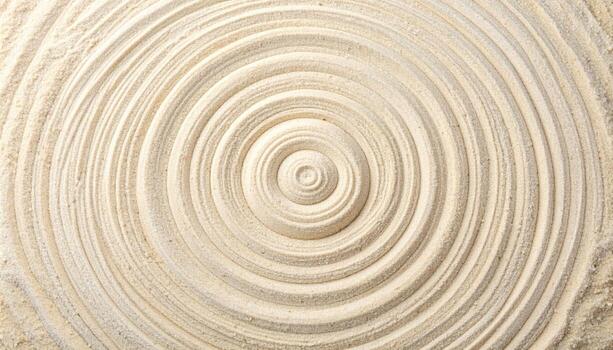 concéntrico círculos meticulosamente rastrillado en multa blanco arena crear un calmante zen jardín modelo para un meditativo y pacífico atmósfera. foto