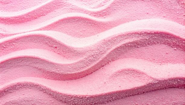 The abstract pattern of rippled pink sand creates a soft, delicate texture that is perfect for backgrounds, designs, and feminine themes. photo