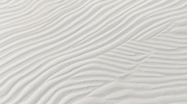 Wavy white sand dunes create a serene and minimalistic landscape with natural ripples and delicate patterns under soft sunlight on a beach. photo