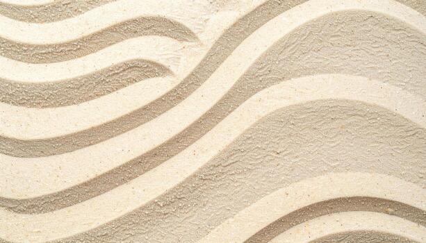 The textured surface of rippled sand shows a calming pattern of curves and lines creating a peaceful zen-like backdrop or environment. photo