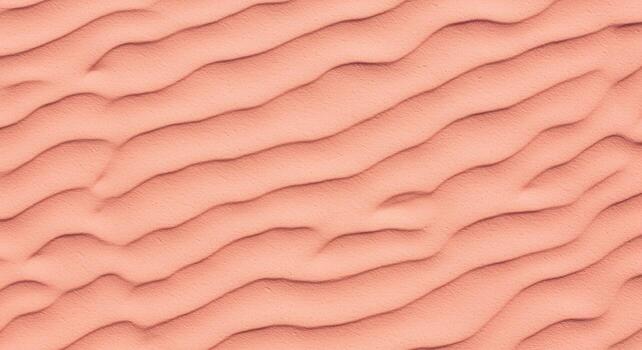 The wavy patterns of desert sand are visible in the high angle shot as a natural beige texture with rolling curves creating abstract art. photo