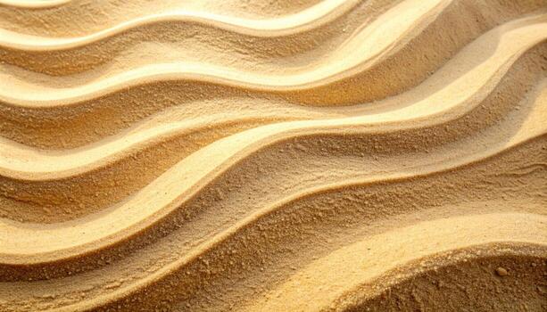 Golden waves of patterned sand create a mesmerizing abstract texture, showcasing light and shadow across the textured surface design. photo