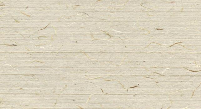 Natural handmade paper with delicate plant fibers creates a subtly textured background suitable for artistic and eco-conscious designs and projects. photo