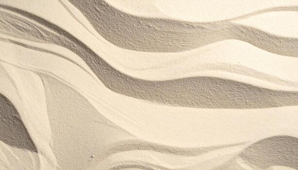Abstract sand dune surface texture shows curves and shadows for calm backdrop and design element that illustrates movement with soft colors. photo