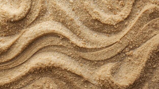 The intricate patterns on a sandy beach, sculpted by the ocean tides, create a visually appealing and textured natural background effect. photo