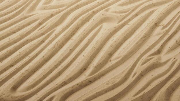 Abstract sandy beach texture with wavy pattern creating a peaceful scene in tan and beige tones of the smooth arid desert landscape. photo