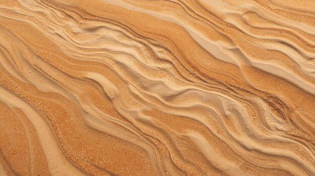 The swirling bands of sedimentary rock create a beautiful abstract pattern of ochre and beige tones in a natural undulating landscape. photo